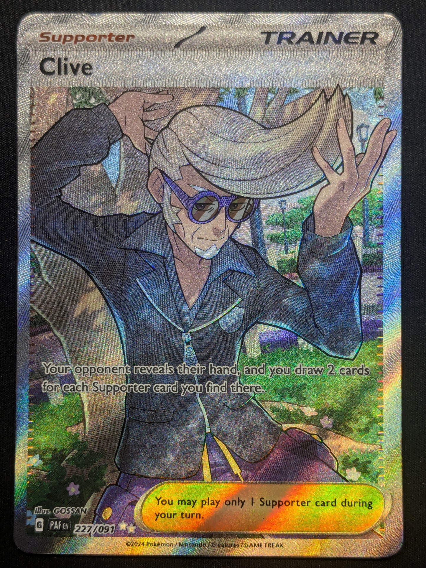 Clive - 227/091 - SV: Paldean Fates